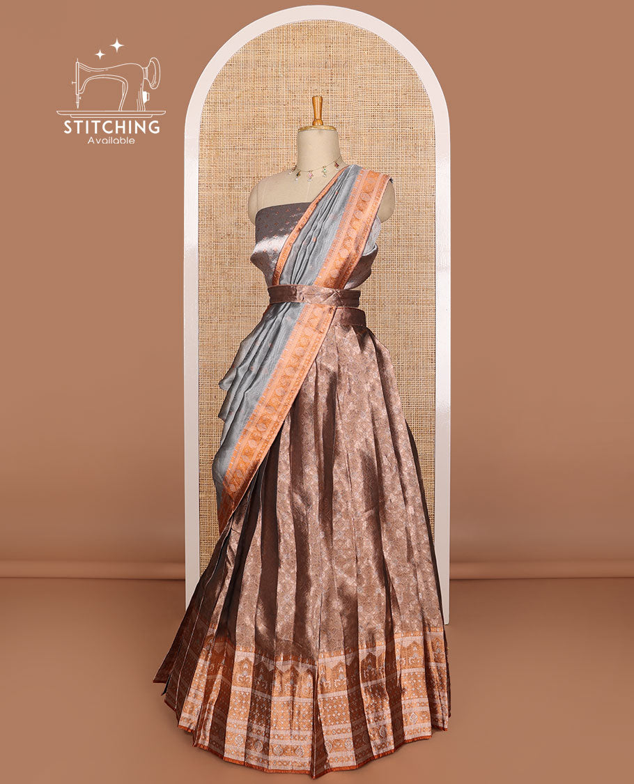 Mauve buttas tissue half saree with contrast zari design border, checked design blouse & floral design dhavani