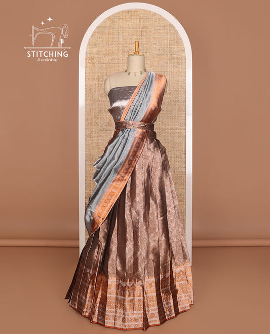 Mauve buttas tissue half saree with contrast zari design border, checked design blouse & floral design dhavani