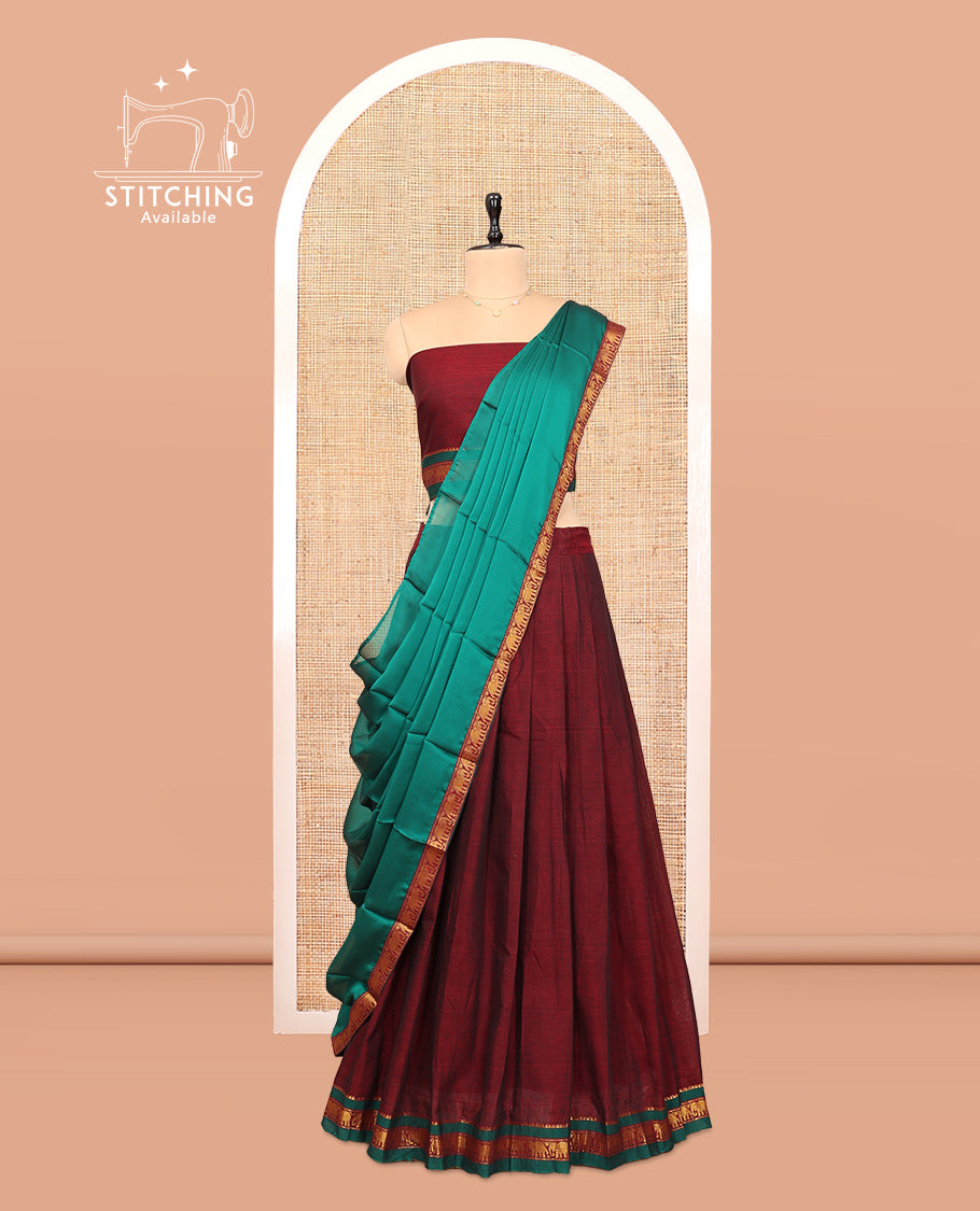 Maroon Cotton Half-Saree Features Plain Skirt, a Contrast Traditional Zari Border, a Matching Blouse, and a Contrast Dhavani