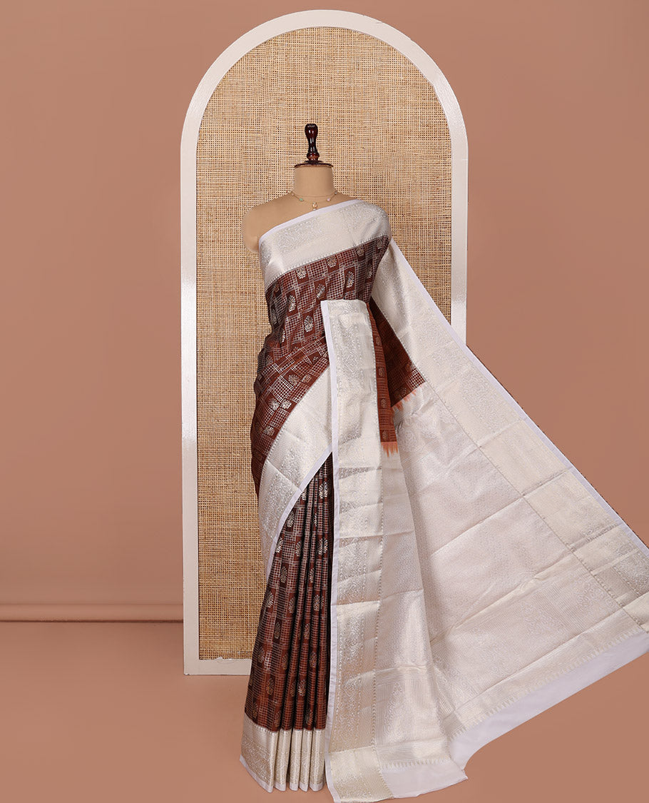 Brown Budget Silk Saree, Ornamented with Peacock and Elephant Motif Enclosed Checks, Complemented by a Contrast Traditional Zari Designs Woven Border, Pallu of Jaal Designs, and Paired with a Contrast Blouse