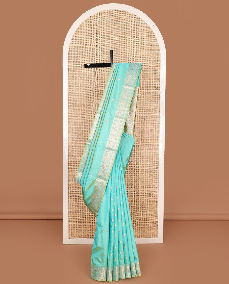 Turquoise buttas kathan silk saree, floral creeper border, and Mughal-style floral jaal pallu