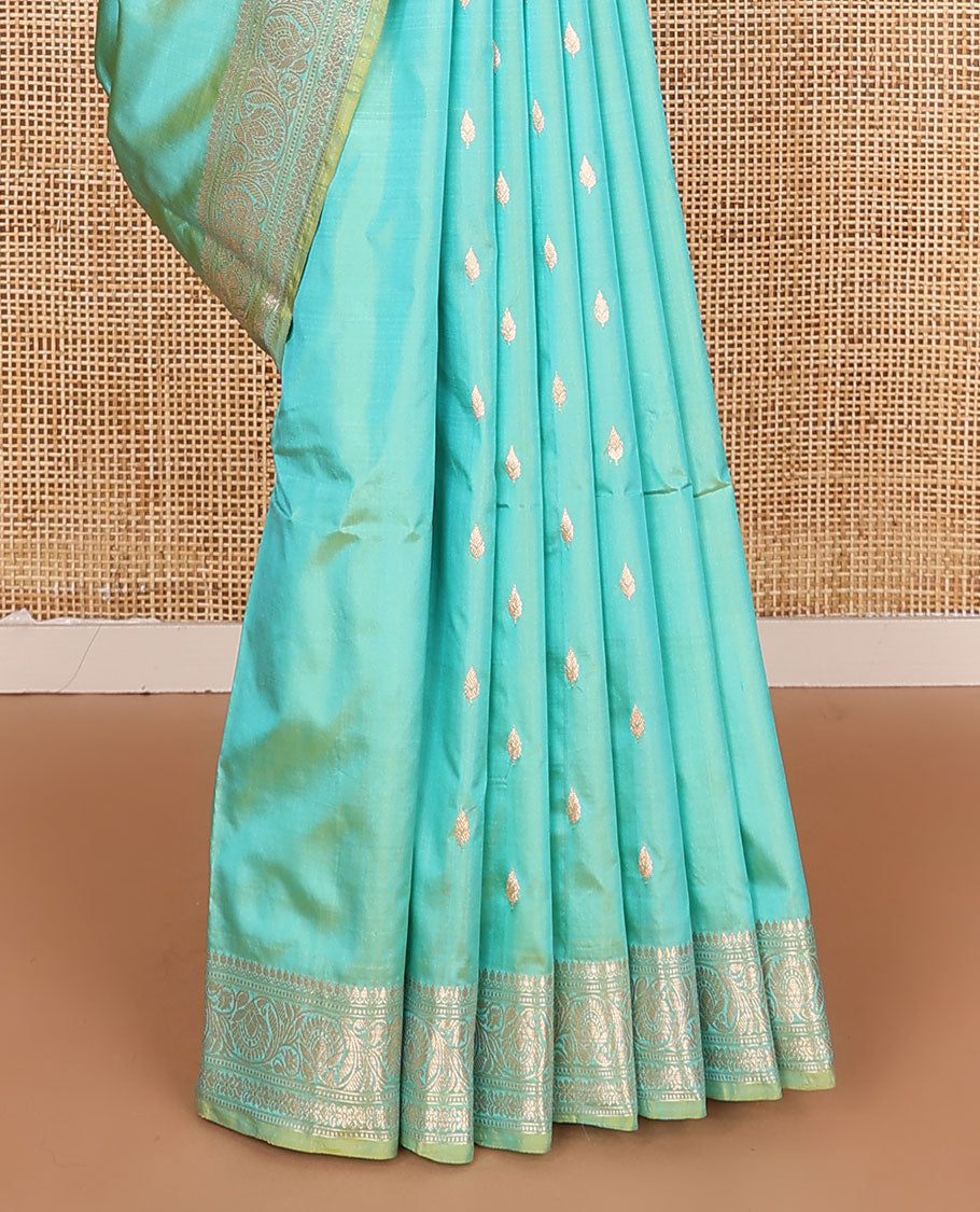 Turquoise buttas kathan silk saree, floral creeper border, and Mughal-style floral jaal pallu