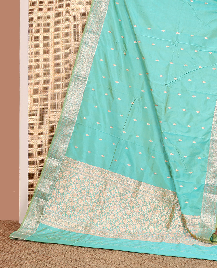 Turquoise buttas kathan silk saree, floral creeper border, and Mughal-style floral jaal pallu