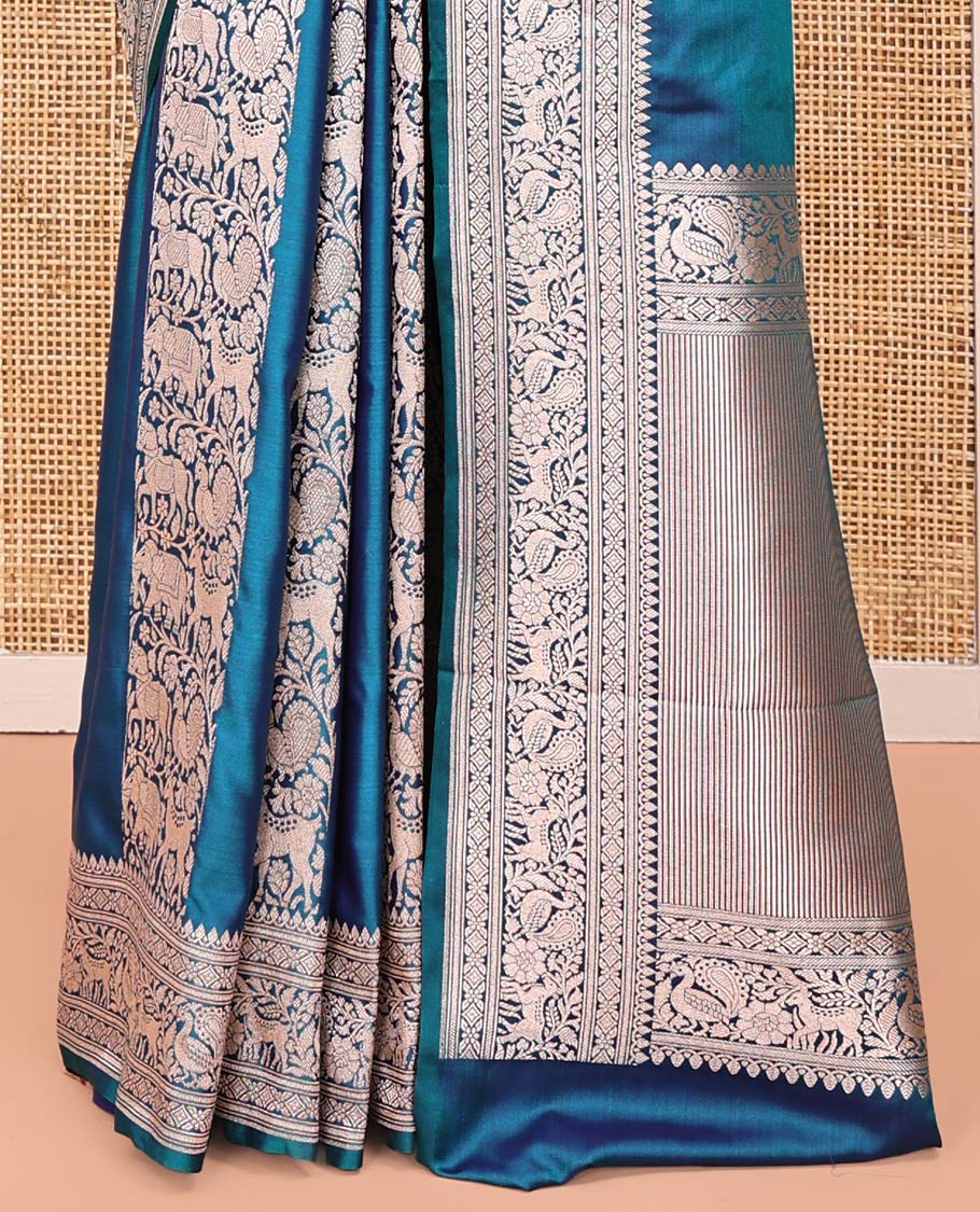 Blue Banarasi Silk Saree, Majestically Detailed with Floral and Animal Motifs on Its Body, Highlighted by a Self-Border of Traditional Designs, Pallu of Stripes, and Paired with a Matching Blouse