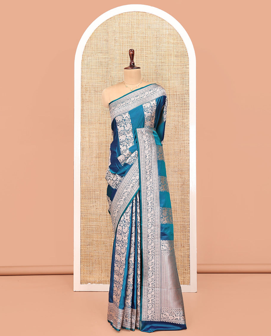 Blue Banarasi Silk Saree, Majestically Detailed with Floral and Animal Motifs on Its Body, Highlighted by a Self-Border of Traditional Designs, Pallu of Stripes, and Paired with a Matching Blouse