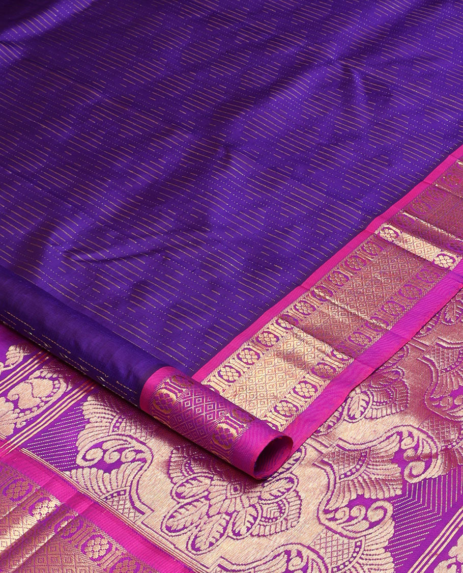 Violet zari buttas Kanchipuram silk saree, contrast one-sided border of laddu kamalam, and mayil kann designs, and intricate pallu