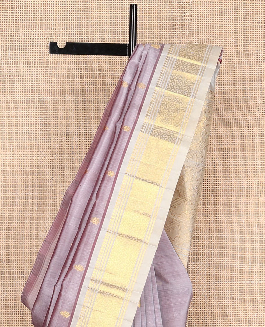 Mauve zari buttas kanchipuram silksaree, contrast one-sided border of paneer sombu,banaras & jaal & zari design pallu