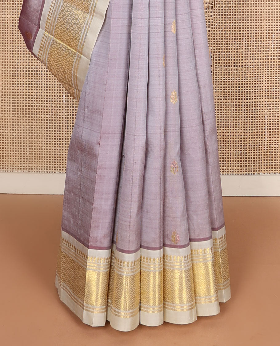 Mauve zari buttas kanchipuram silksaree, contrast one-sided border of paneer sombu,banaras & jaal & zari design pallu