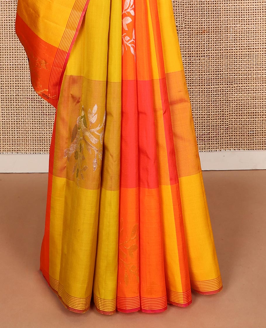Multi-colored bird buttas enclosed macro-checked Kanchipuram silk saree, striped piping border, and zari-rich pallu
