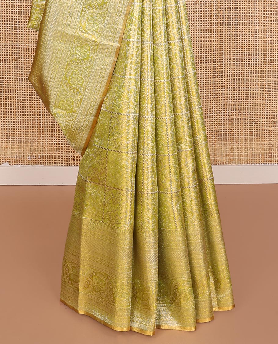 Green Kanchipuram Tissue Silk Saree, Detailed with Jacquard Design on Its Body, Highlighted by a Zari Border of Kathir, Mayil Kann, and Dhavana Kodi Designs, Gracefully Embellished Pallu, and Paired with a Matching Blouse