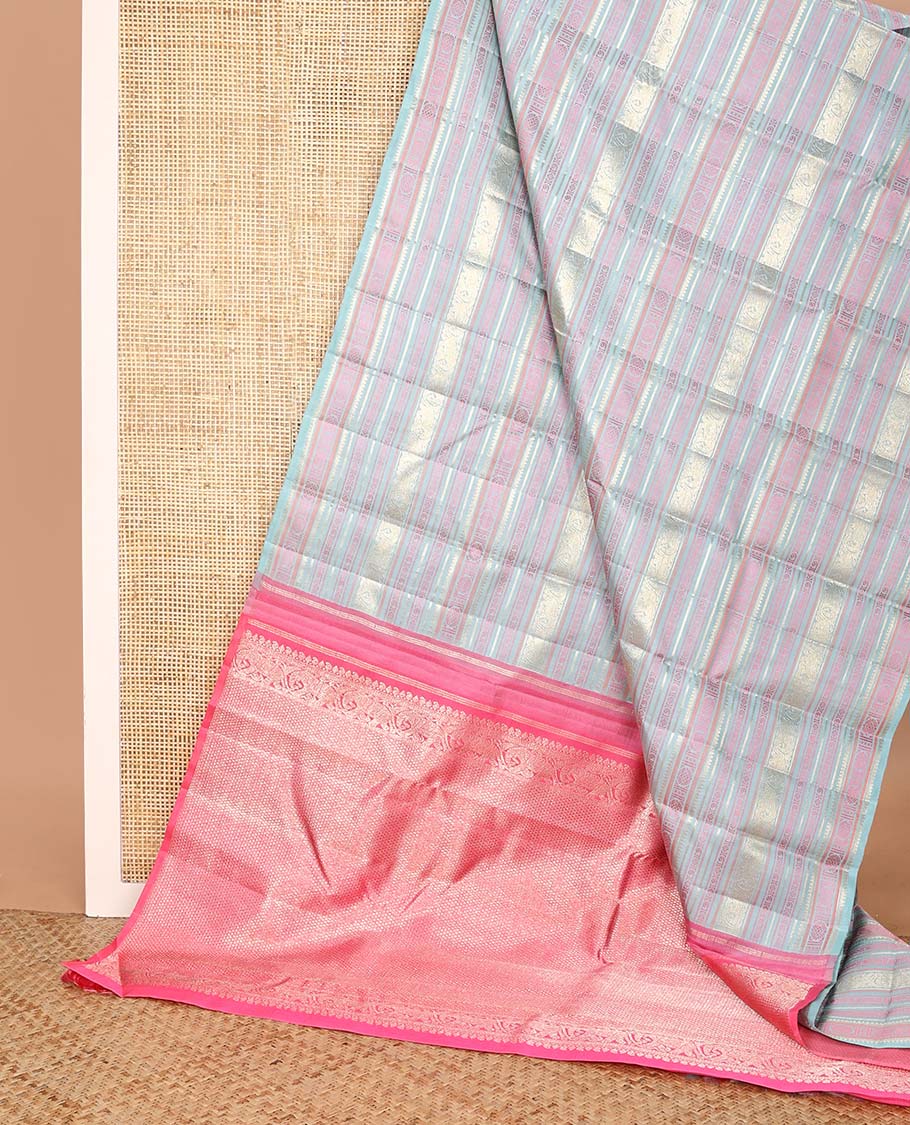 Borderless pastel blue traditional motifs steeped Kanchipuram silk saree, contrast pallu of mayil kann designs