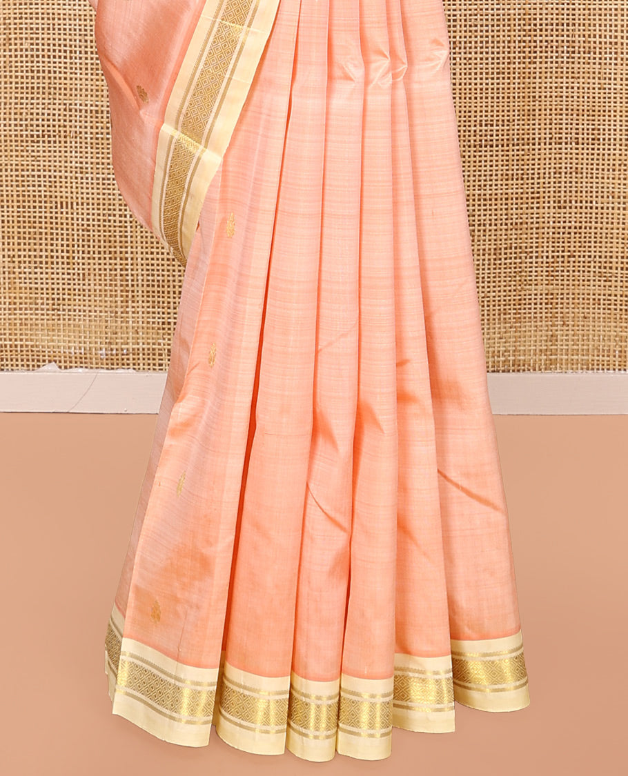 Peach Kanchipuram Silk Saree, Detailed with Zari Buttas All Over Its Body, Complemented by a Contrast One-Sided Border of Banaras, and Mayil Kann Designs, Pallu of Zari Designs, and Comes Without a Blouse