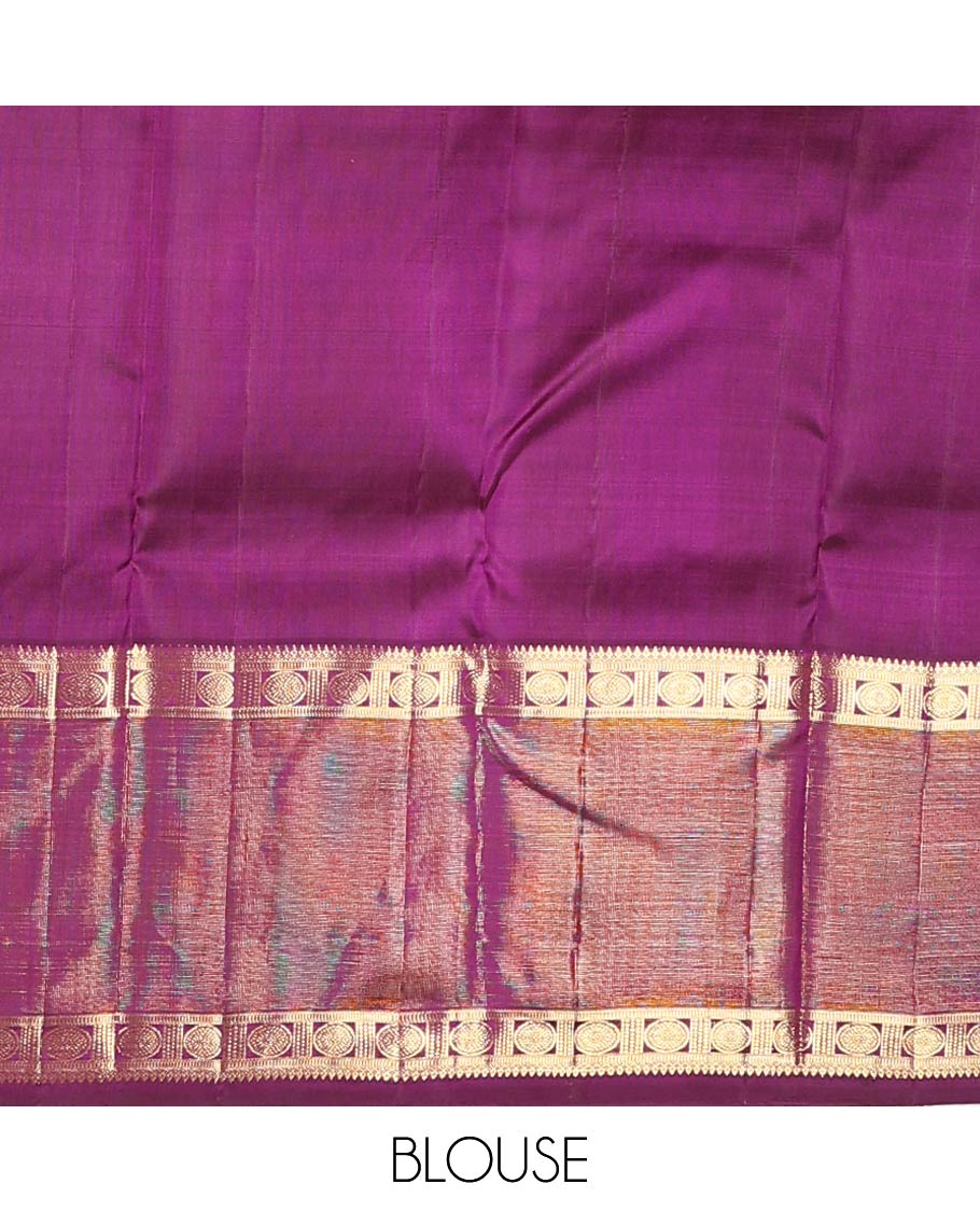 Purple thick zari checked with Mughal buttas designer saree, rettai pettu border of thilakam mokku, muthu, and chakram designs, and mayil kann design pallu