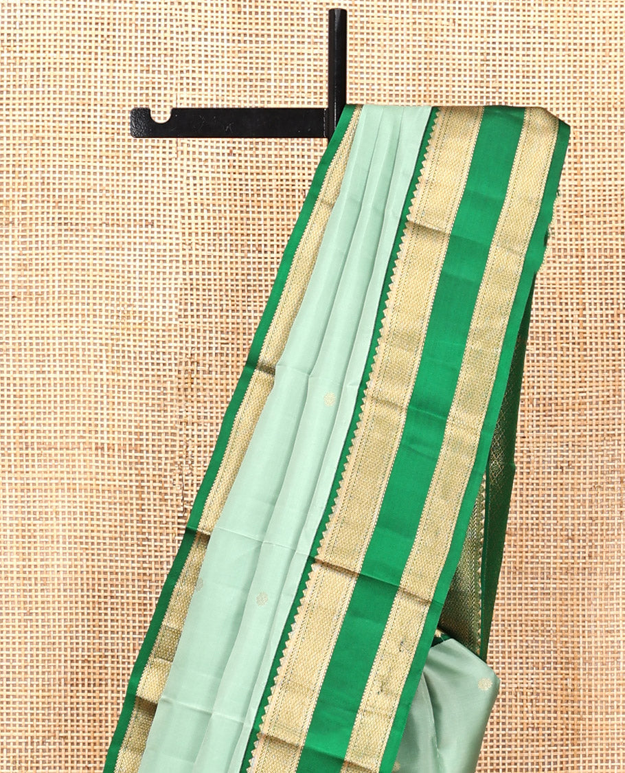 Green Kanchipuram Silk Saree, Woven with Zari Buttas, Contrast Korvai Rettai Pettu Border of Rekku, Kathir, and Mayil Kann Designs, Pallu of Jaal Design, and a Contrast Blouse