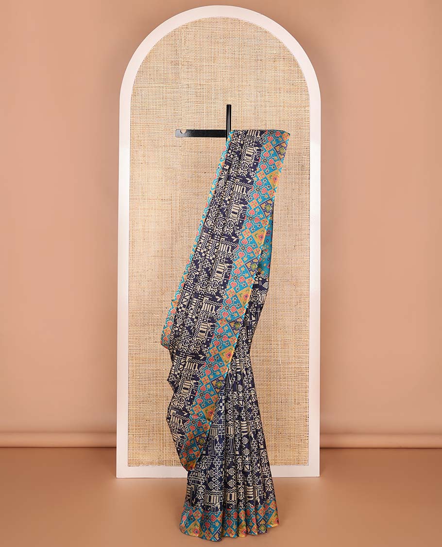Blue geometric design printed silk saree with ikkat style border & floral ikkat style pallu