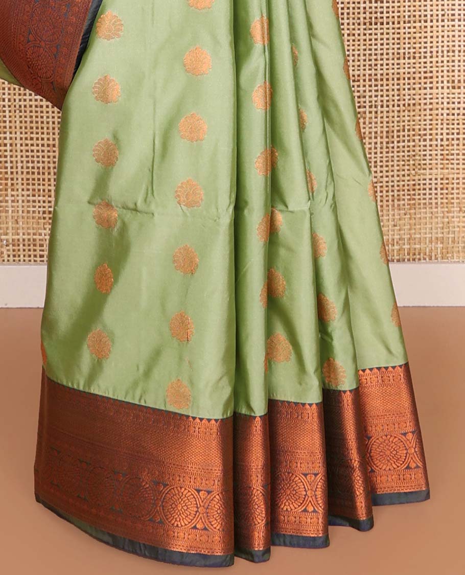 Green floral motifs soft silk saree with contrast floral design border & argyle design pallu
