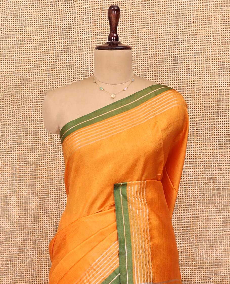 Yellow Plain Banana Pith Saree, Subtle Striped Contrast Border, Pallu of Gleaming Zari Stripes, and Paired with a Matching Blouse