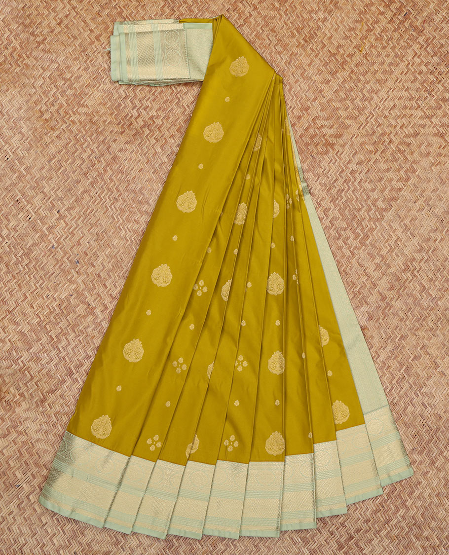 Green Budget Silk Saree Featuring Zari Buttas, a Contrast Traditional Zari Border, Grand Pallu, and a Contrast Blouse