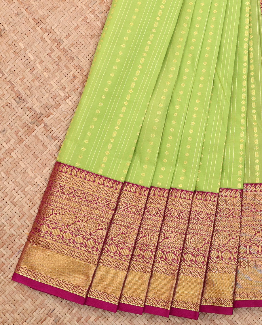Parrot Green Budget Silk Saree, Detailed with Buttas and Stripes All Over Its Body, Complemented by a Contrast Traditional Zari Design Border, Grand Pallu, and Paired with a Contrast Blouse