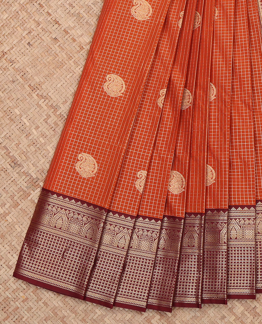 Orange Budget Silk Saree, Steeped in Richness of Paisley Buttas and Zari Checks All Over Its Body, Complemented by a Contrast Traditional Border, Jaal Pallu, and Paired with a Contrast Blouse