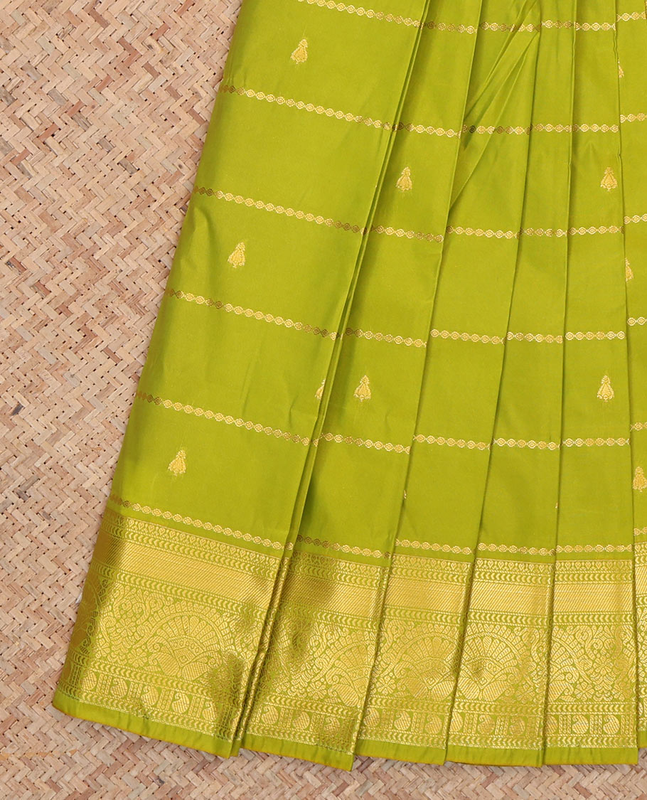 Green Budget Silk Saree, Decked Up with Zari Buttas and Stripes, Complemented by Traditional Zari Border, a Jaal Pallu and a Contrast Blouse