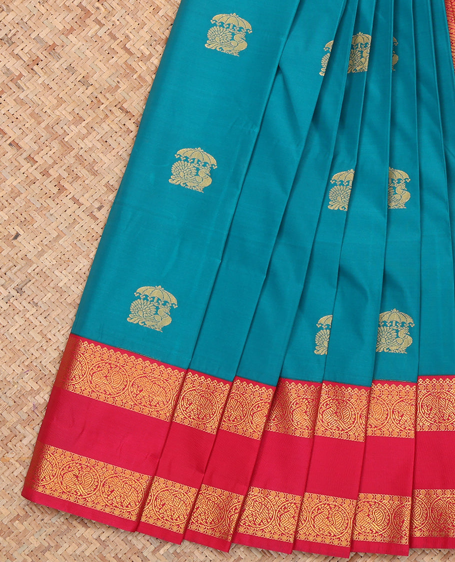 Blue Budget Silk Saree, Bedecked with Peacock Buttas, a Contrast Traditional Zari Rettai Pettu Border, Grand Pallu, and a Contrast Blouse