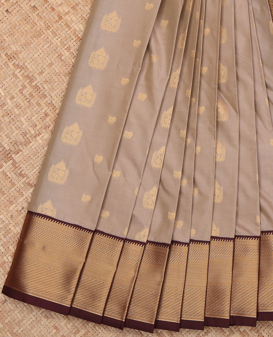 Grey Budget Silk Saree, Subtly Sparkled with Zari Buttas, a Contrast Traditional Ganga-Jamuna Border, Intricate Pallu, and a Contrast Blouse