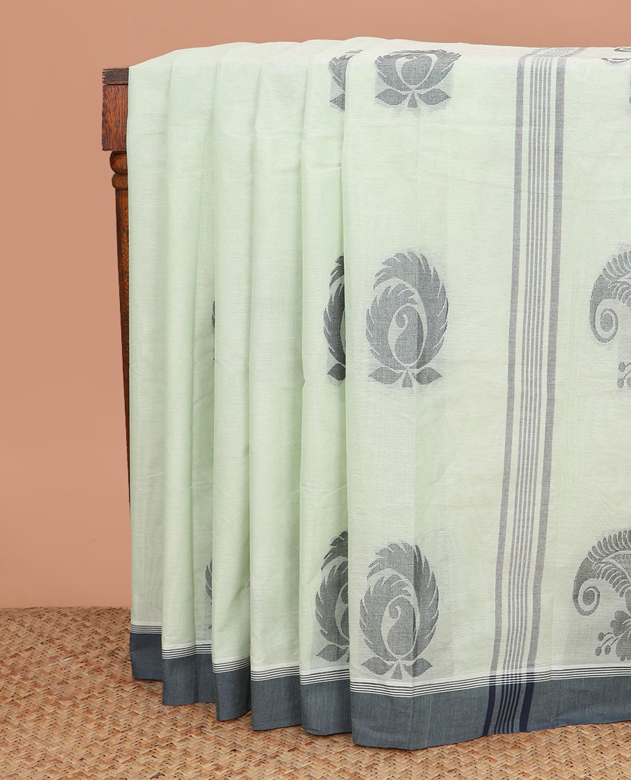 Pastel green buttas kanchi cotton saree, contrast border, and paisley design pallu