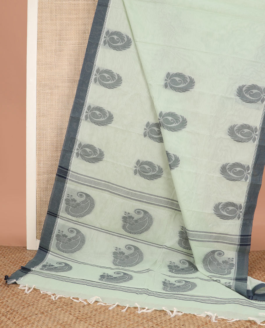 Pastel green buttas kanchi cotton saree, contrast border, and paisley design pallu