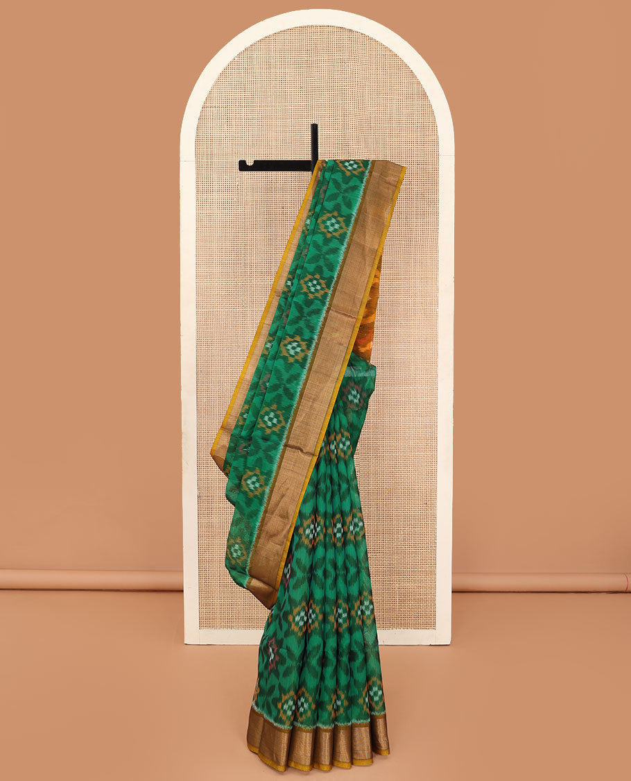 Green ikkat floral patterned silk cotton saree, contrast bavanji border, and pallu of ikkat Mughal style design weave