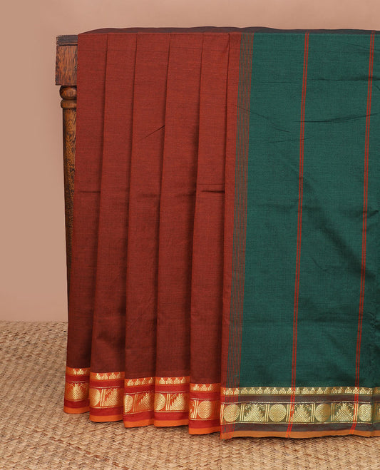 Dark orange plain design poly cotton saree, contrast traditional zari border & contrast striped pallu