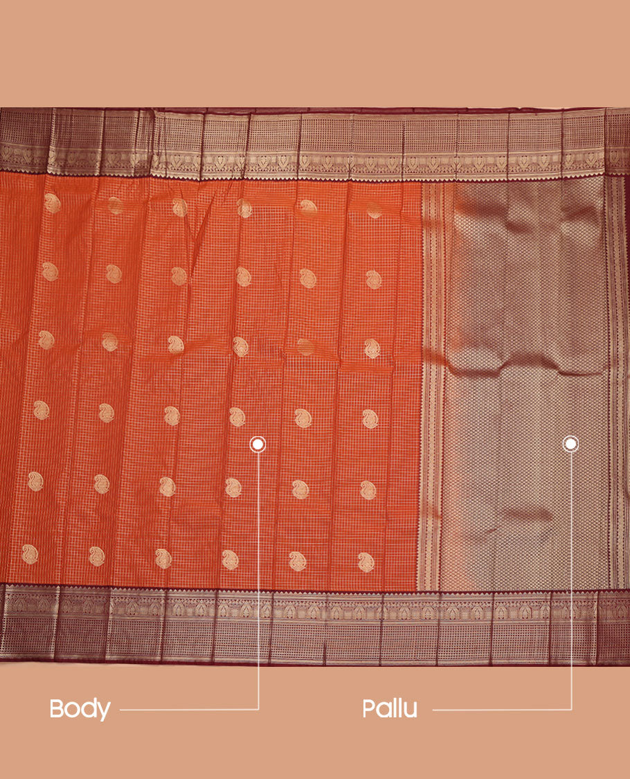 Orange Budget Silk Saree, Steeped in Richness of Paisley Buttas and Zari Checks All Over Its Body, Complemented by a Contrast Traditional Border, Jaal Pallu, and Paired with a Contrast Blouse