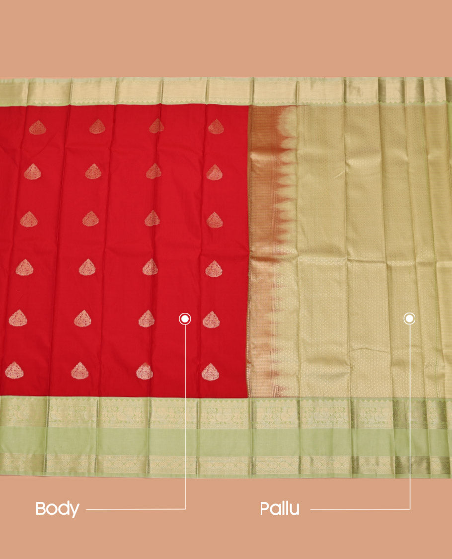 Red Budget Silk Saree, Richly Detailed with Zari Buttas All Over Its Body, Complemented by a Contrast Traditional Zari Design Rettai Pettu Border, Gleaming Zari-Woven Jaal Pallu, and Paired with a Contrast Blouse