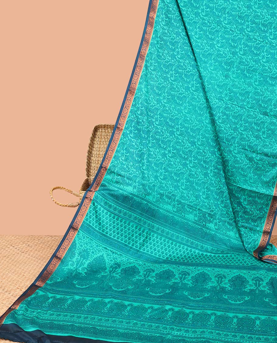 Blue paisley printed semi-banaras printed saree, contrast floral border & intricate pallu