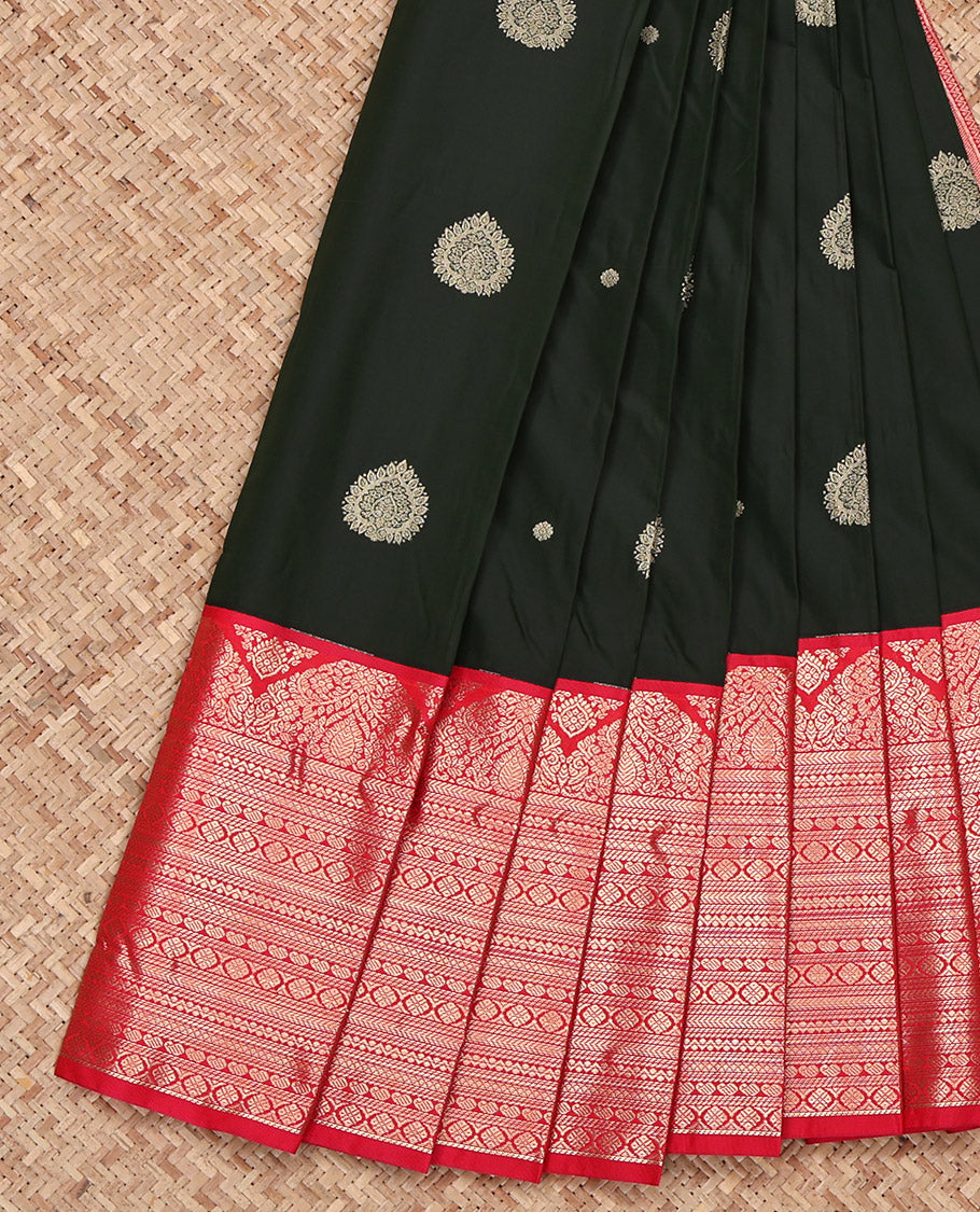 Black Budget Silk Saree, Ornamented with Zari Buttas on Its Body, Complemented by a Contrast Traditional Zari Design Border, Intricately Designed Pallu, and Paired with a Contrast Blouse
