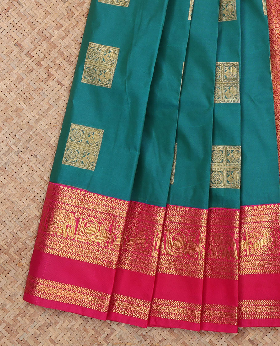 Green Budget Silk Saree, Highlighted with Peacock-Chakra Buttas, a Contrast Traditional Zari Rettai Pettu Border, a Grand Pallu and a Contrast Blouse