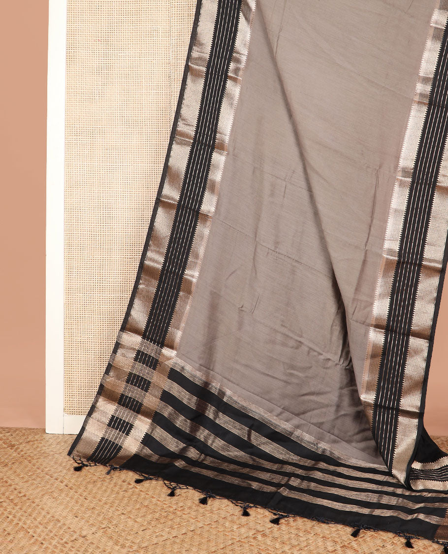 Grey plain assam silk saree, contrast traditional zari design border, and zari design pallu