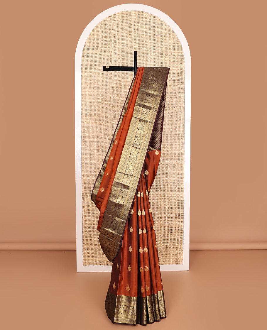 Orange zari buttas Vasundhara silk mix saree, contrast border of thilakam, neli, kathir, kodi visiry, and mayil and jaal pallu