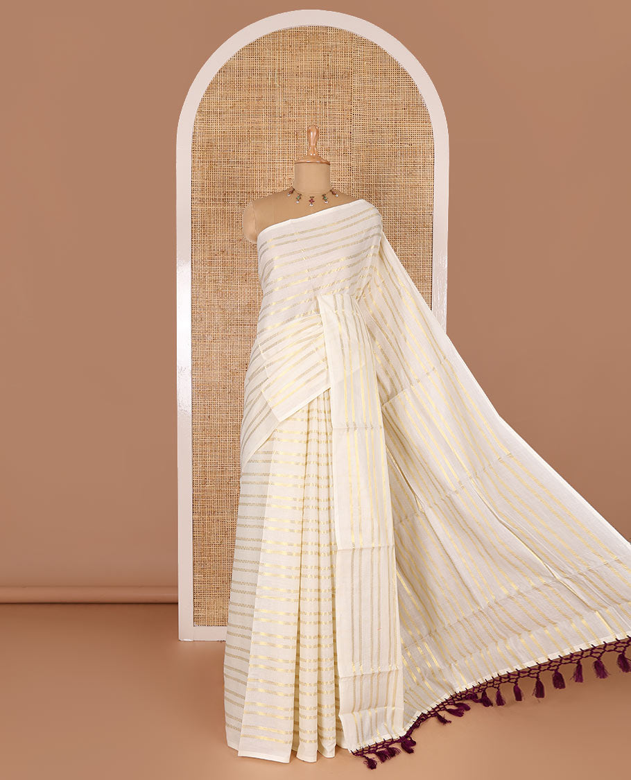 Borderless cream and maroon horizontal zari muthu striped Kerala cotton saree, self-pallu with tassels and a matching blouse