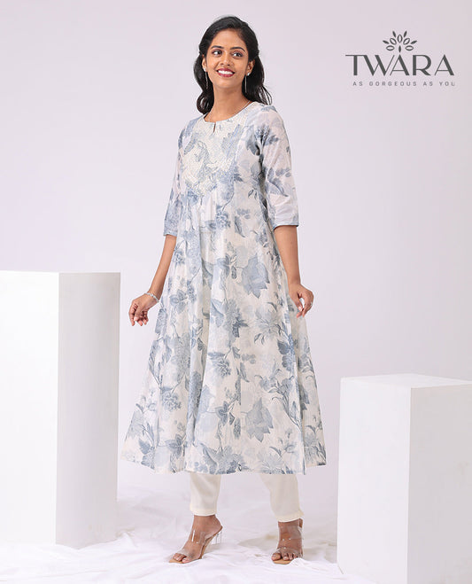 Twara cream floral print , embroidered round neck, 3/4 th sleeve , below knee lenght a-line kurti