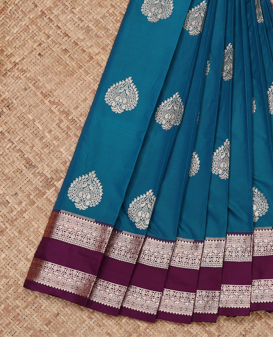 Blue Budget Silk Saree, Decorated with Zari Buttas All Over Its Body, Complemented by a Contrast Traditional Zari Design Rettai Pettu Border, Intricate Pallu, and Paired with a Contrast Blouse
