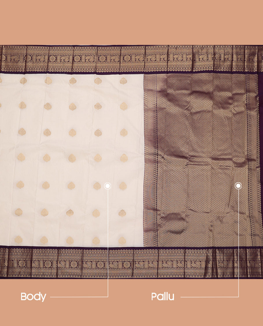 Off-White Budget Silk Saree, Enthralled with Zari Buttas, Complemented by a Contrast Traditional Zari Border, Grand Pallu, and a Contrast Blouse