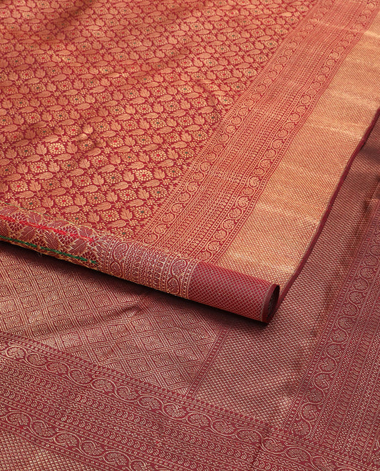Maroon Jacquard Kanchipuram silksaree,zari border of reeku,paisa,banaras,kodi visiry,neli,manga,lavangam & mayil kann & intricate pallu