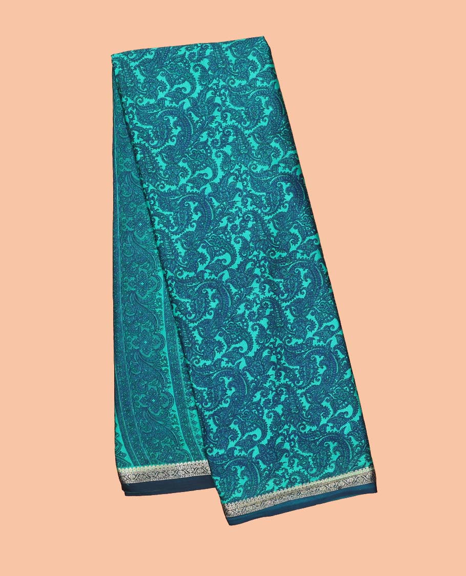 Blue paisley printed semi-banaras printed saree, contrast zari border & intricate pallu