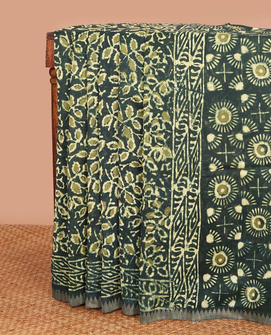 Green batik floral vine printed mul mul cotton saree, geometric printed border, and floral printed pallu
