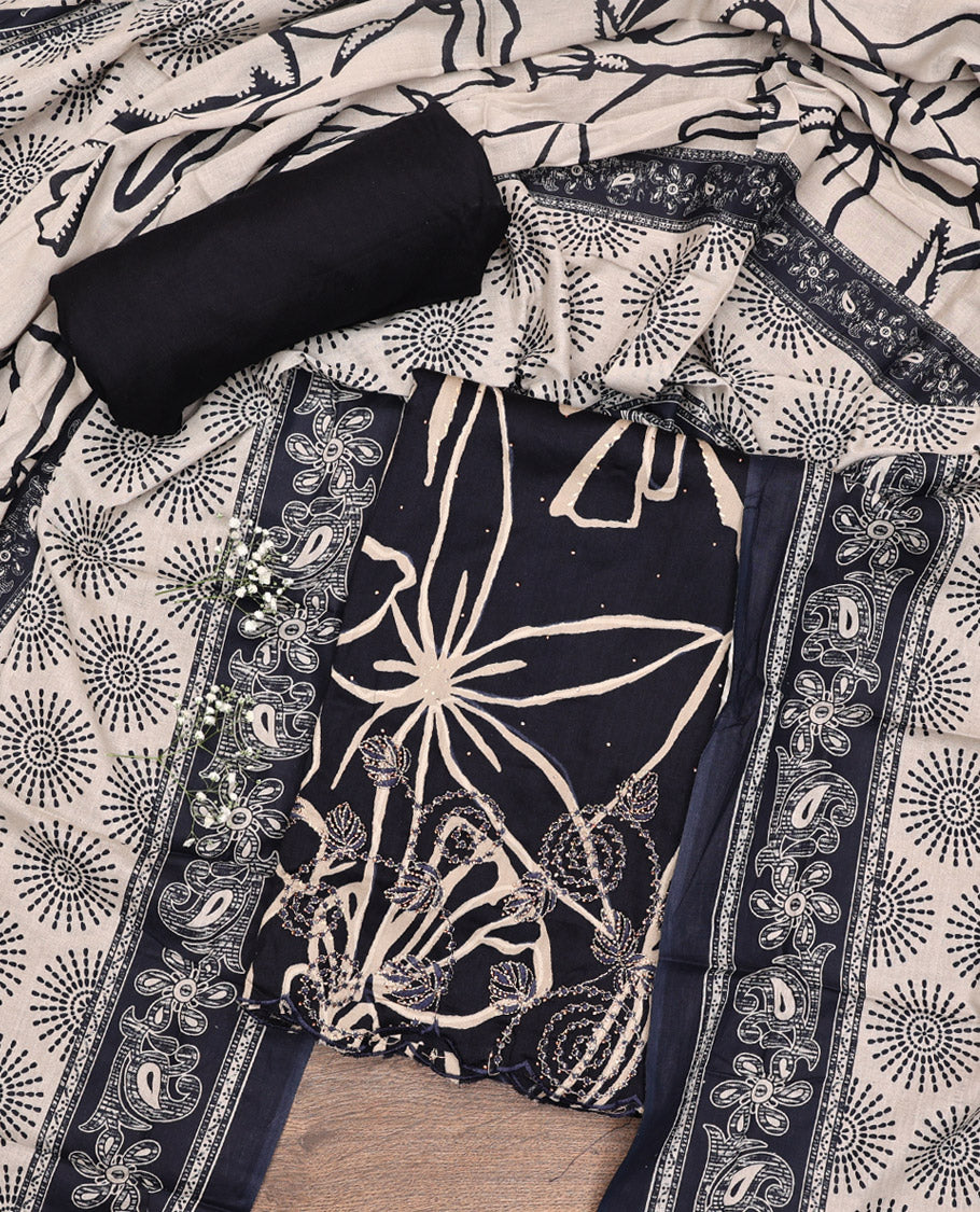 Black Material Chudidar Set, Artfully Detailed with Abstract Print and Floral Embroidered Cotton Top, a Plain Cotton Bottom, and Paired with Intricately Printed Cotton Dupatta