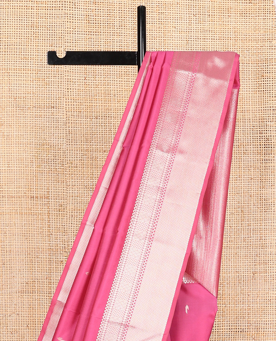 Pink muniya zari buttas Vasundhara silk mix saree, zari border of rekku, paisa, then kuli kann, mayil kann, and paiyaadi kattam and geometric design pallu