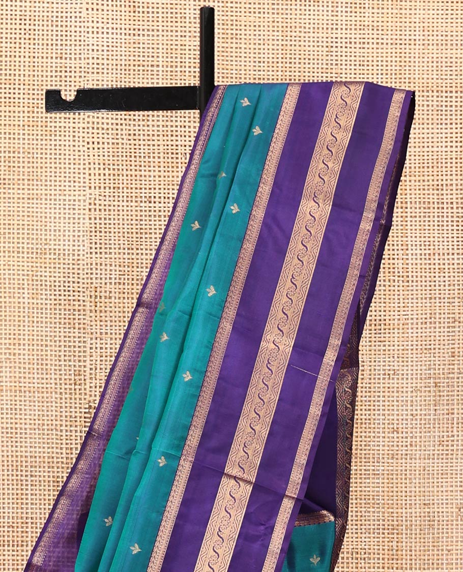 Blue Vasundhara Lite Silk Mix Saree, Showcasing Zari Buttas All Over Its Body, Complemented by Contrast Varisai Pettu Border of Kathir, Muthu, and Floral Designs, Jaal Pallu, and Paired with a Contrast Blouse