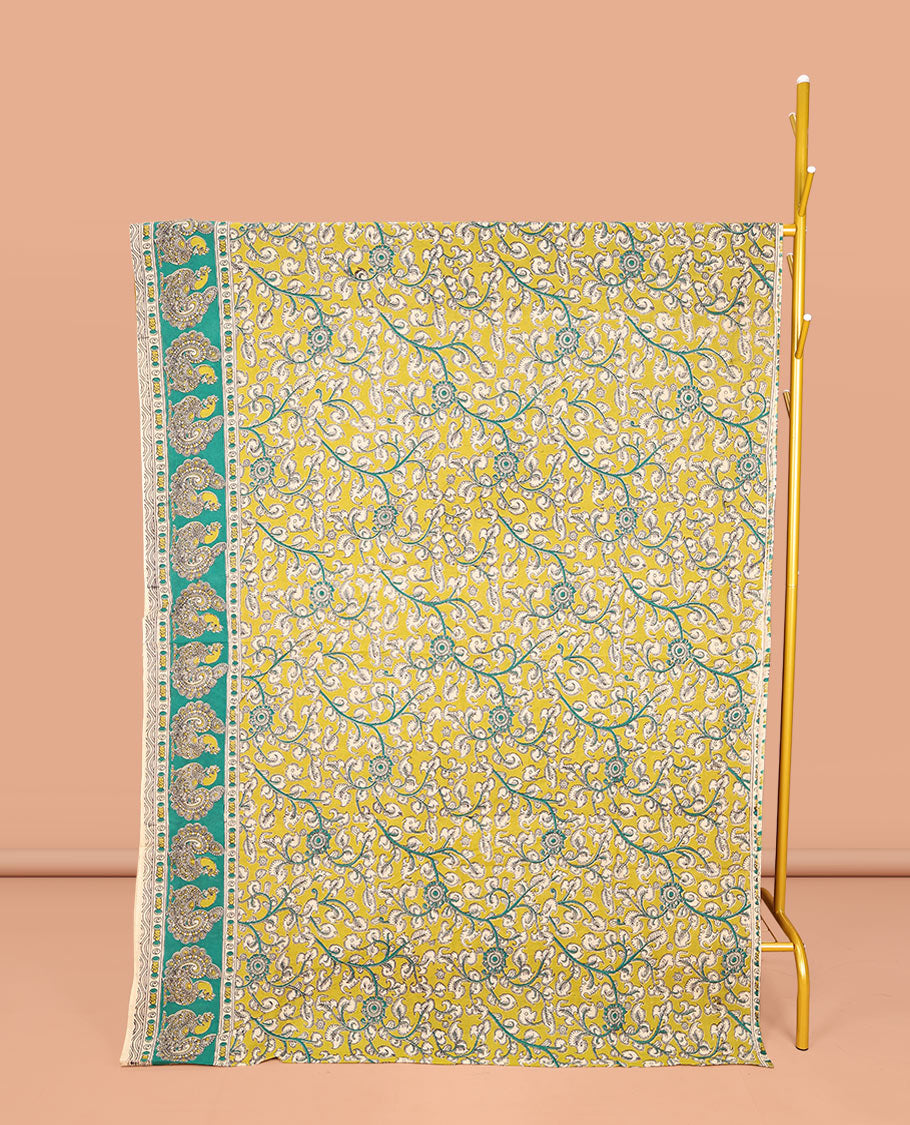 Green Machine-Printed Kalamkari Cotton Saree, Embellished with Floral Vine on Its Body, Complemented by a Contrast Border of Peacock Print, Pallu of Floral-Geometric Print, and Paired with a Matching Blouse