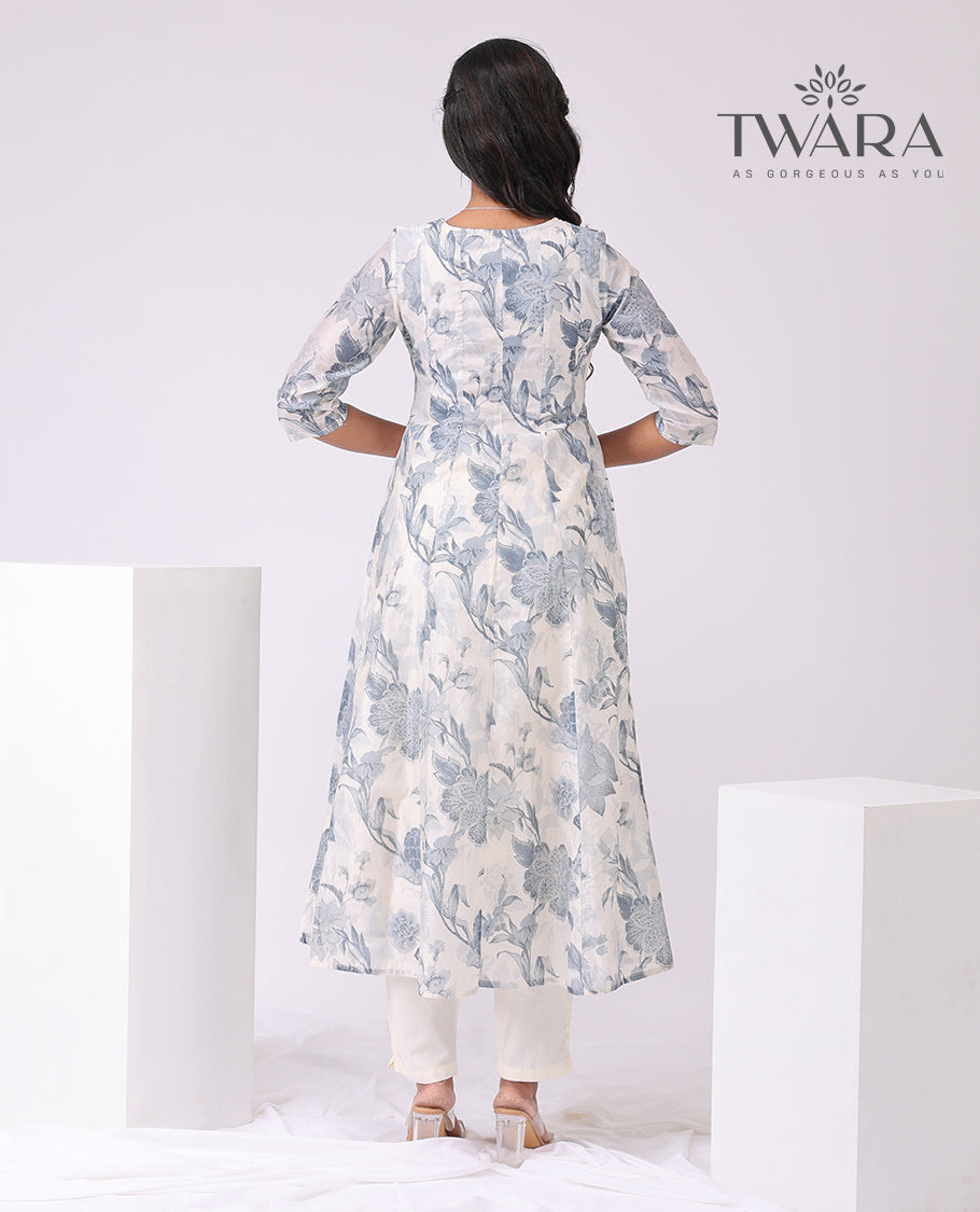 Twara cream floral print , embroidered round neck, 3/4 th sleeve , below knee lenght a-line kurti